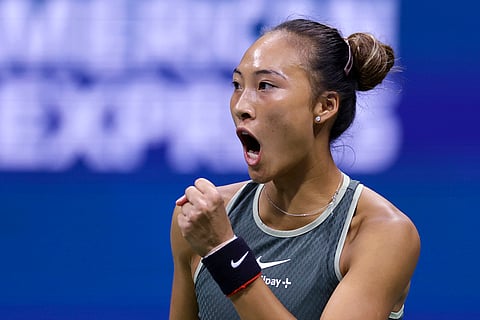 2024 US Open quarterfinals: Zheng Qinwen, of China, pumps her fist after winning a point against Aryna Sabalenka